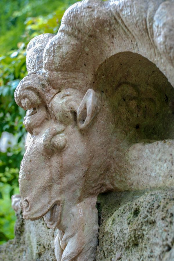 A goat stone sculpture at Schloss Hellbrunn in Salzburg, Austria.