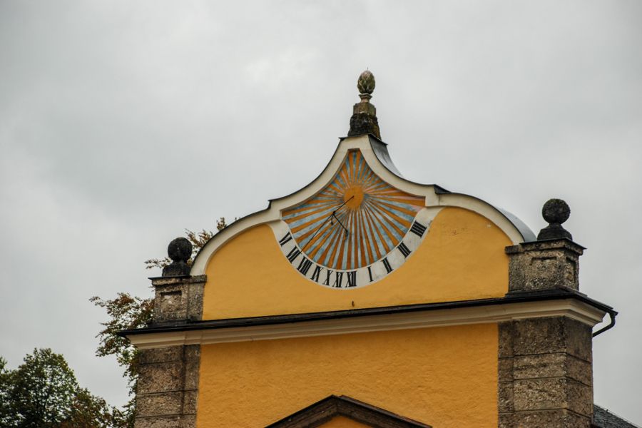 Sundial on a building at Schloss Hellbrunn in Salzburg, Austria.