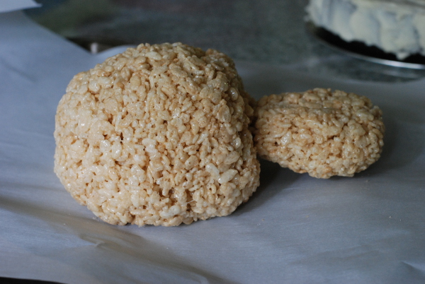 Attaching the rice krispie treat head and muzzle