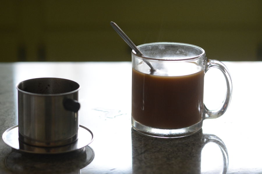 A freshly brewed, piping hot cup of Vietnamese coffee.