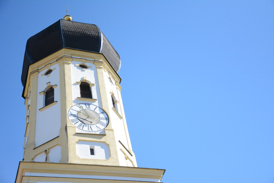 The tower of the St Andreas Church in Aying, Germany.