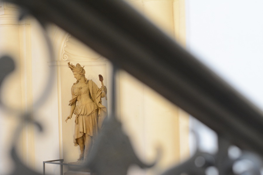 Statue through a railing at Bayerisches Nationalmuseum.