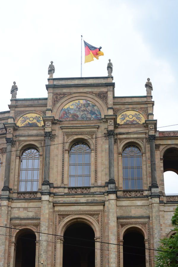 A German flag flies over the Maximilianeum.