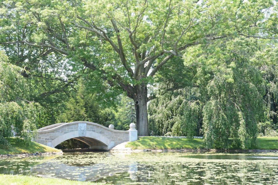 A bridge in the gardens at Nemours Mansion.