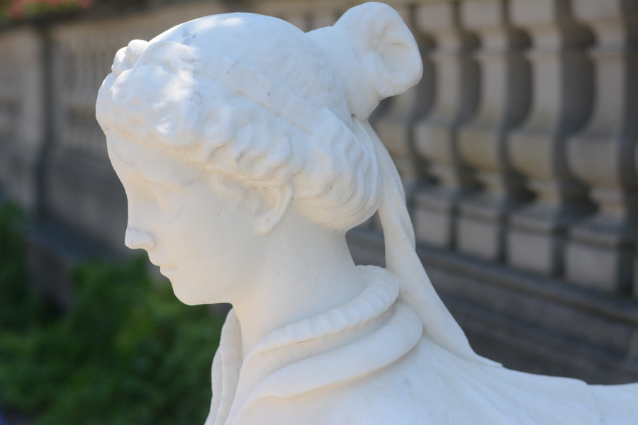 A stone sculpture welcomes guests to Nemours Mansion.