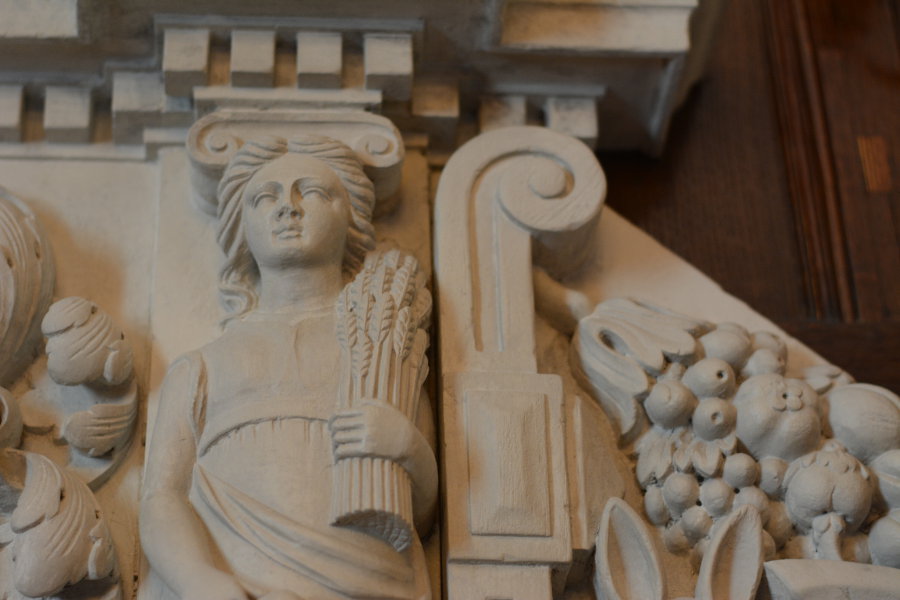 Details on a fireplace mantel in Nemours Mansion.