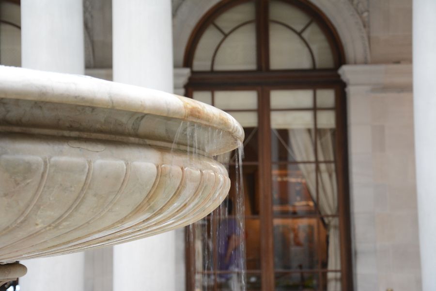 The water fountain in the middle of the Frick Collection's Garden Court.