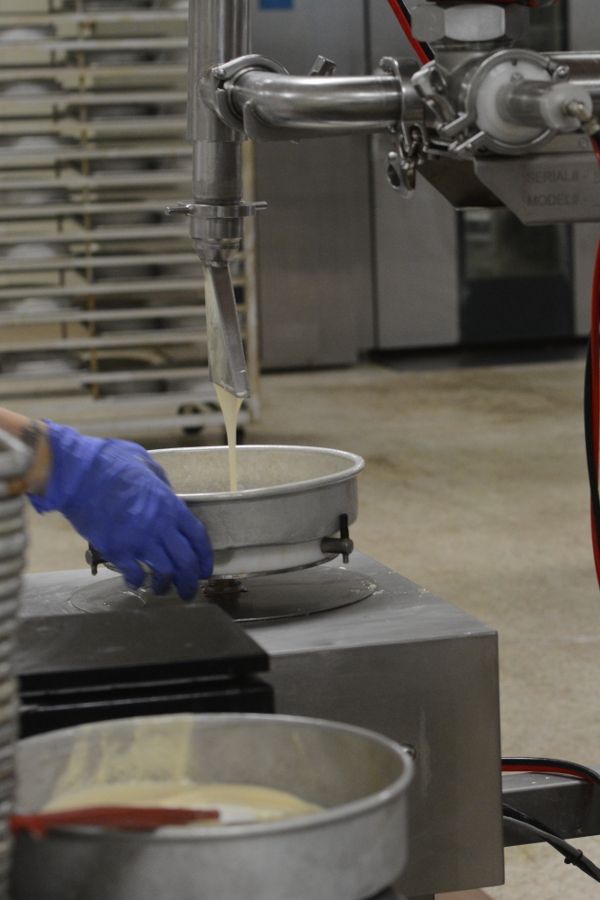 Cake pans get filled for Smith Island Cakes at the Smith Island Baking Company.