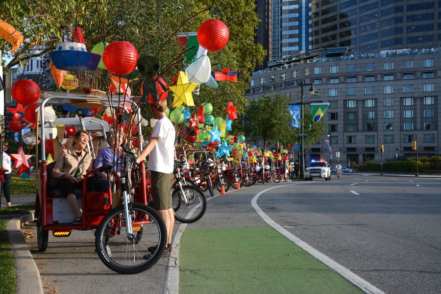 Pedicabs from Cai Guo-Qiang: Fireflies lined up in Philadelphia.