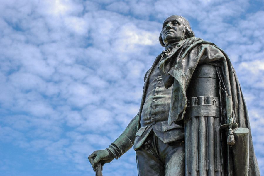 A statue of General George Washington looks over meadows at Valley Forge National Historical Park.