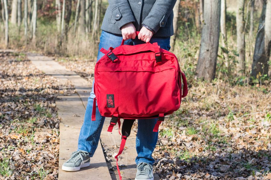 Showing off the side handle of the CabinZero 36L Classic Ultra-Lightweight backpack.