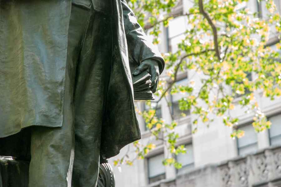 A close up of a sculpture of Chester A Arthur in Madison Square Park in New York City.