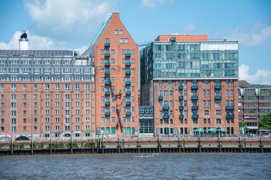 Brick buildings along waterfront in Hamburg, Germany.