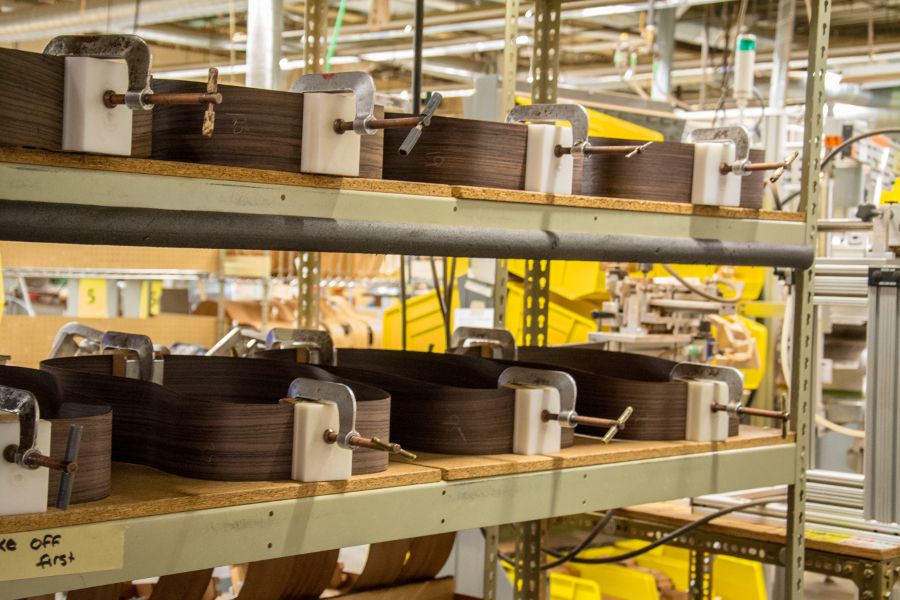 Clamped guitar bodies at the Martin Guitar factory.