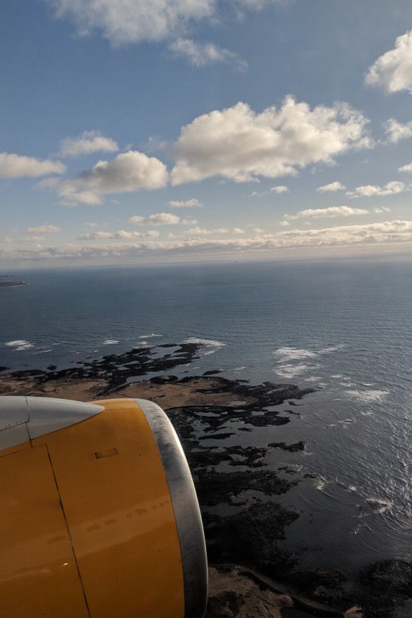 View of Iceland from the airplane window flying Icelandair.