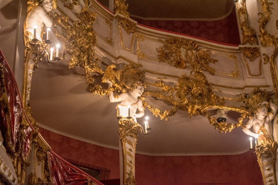 A lit pillar along the boxes at the Cuvilliés Theatre in Munich, Germany.