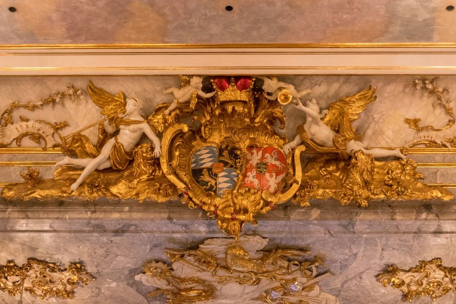 A royal crest hiding in the lavish decoration at the Cuvilliés Theatre in Munich, Germany.