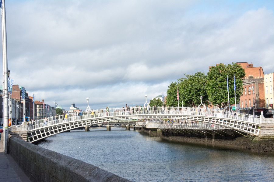 Ha'penny Bridge spanning the River Liffey in Dublin, Ireland.