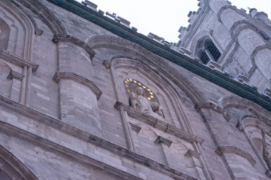 A close up of the exterior of the Notre-Dame Basilica in Montreal, Canada.