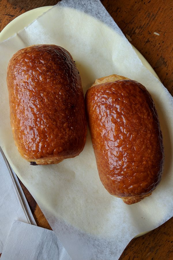 A pair of chocolatine, or Pain au chocolat (chocolate croissants), at Montreal's Pâtisserie Au Kouign Amann.