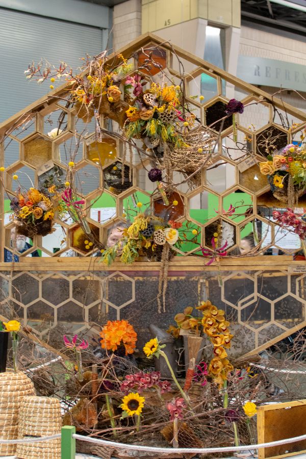 A ornamental honey comb full of 10,000 Italian honeybees at the Philadelphia Flower Show 2019.