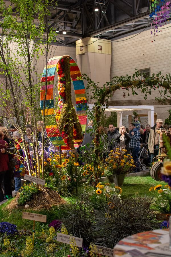 A colorful peace sign in an exhibit at the Flower Show.