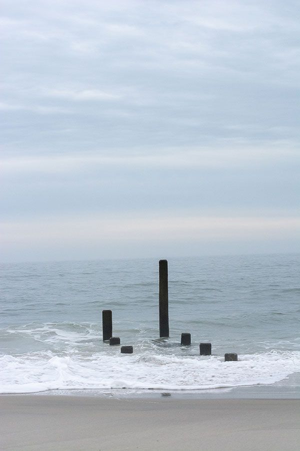 Pilings in the ocean.