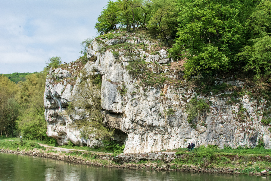 Hikers walk along the Danube River Gorge, or Donaudurchbruch.