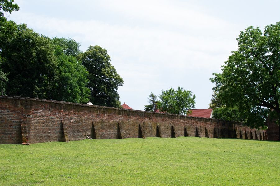 A brick wall across a field at George Washington's Mount Vernon.