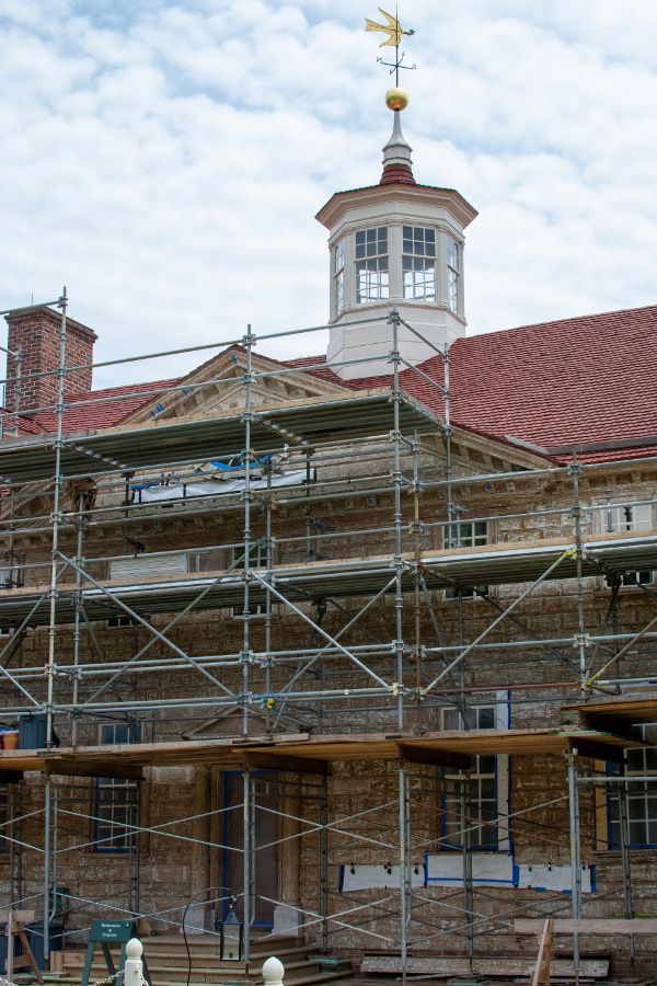 Scaffolding covers the front of the mansion at Mount Vernon.