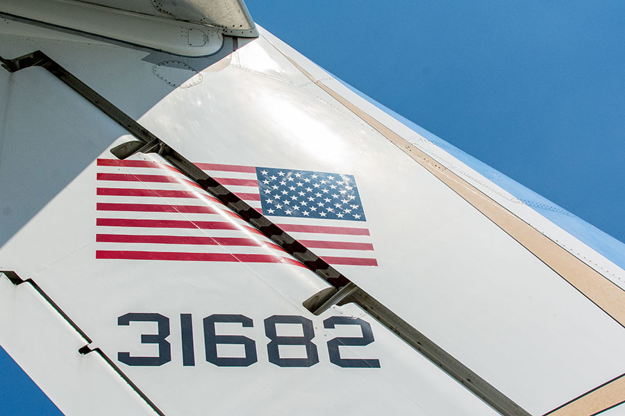 American flag emblazoned on the tail of an aircraft.