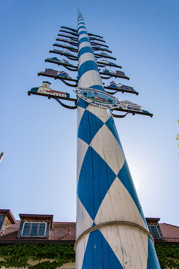 Painted white and blue for Bavaria, the Maypole (or Maibaum) stands proudly at the center of the German town of Aying. #germany #bavaria #tradition #maibaum #maypole