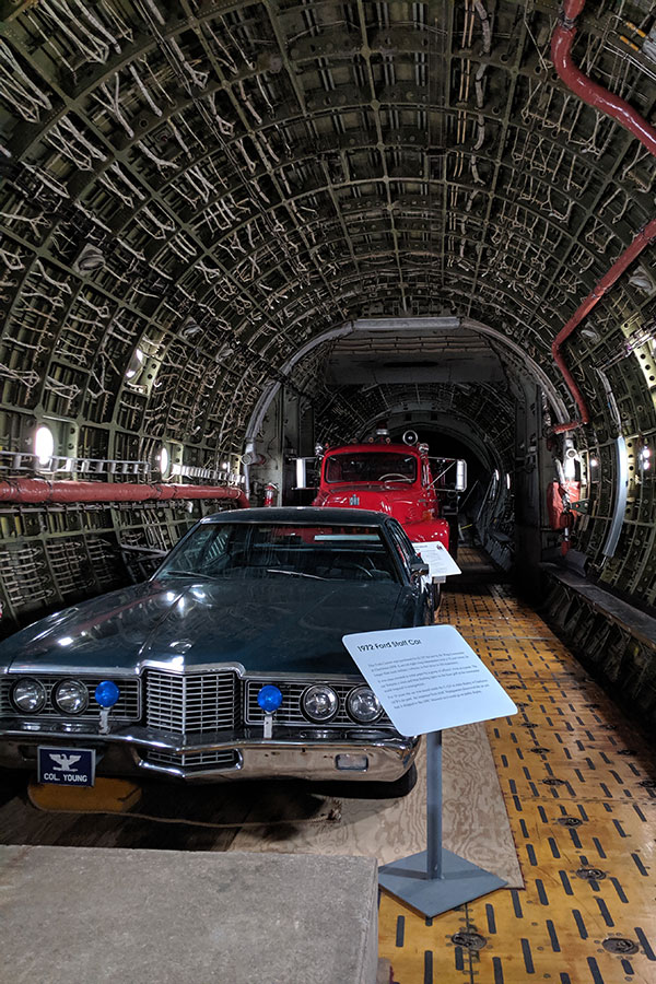 Two cars inside a C-133B Cargomaster.