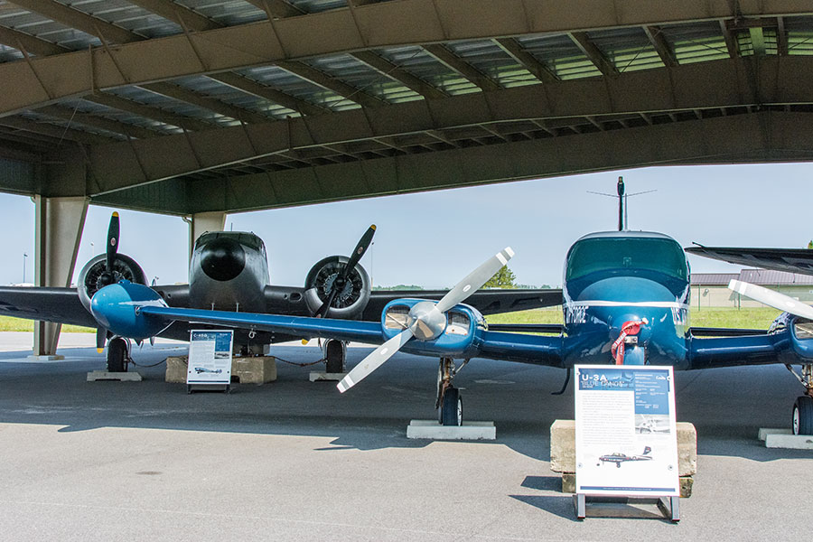 A C-45G Expeditor and a U-3a Blue Canoe aircraft at AMC Museum.