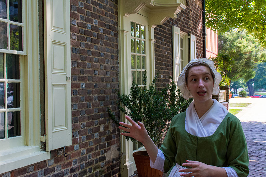 Annie leads visitors around The Green for a walking tour of Historic Dover, Delaware.