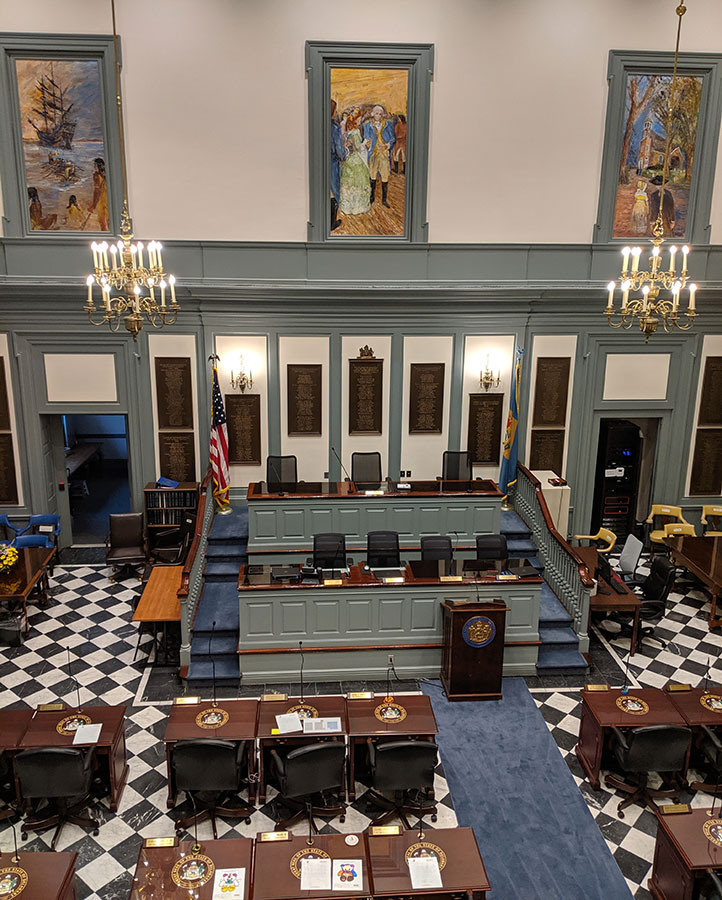 A view from the public gallery of a chamber of the Delaware Legislative Hall.