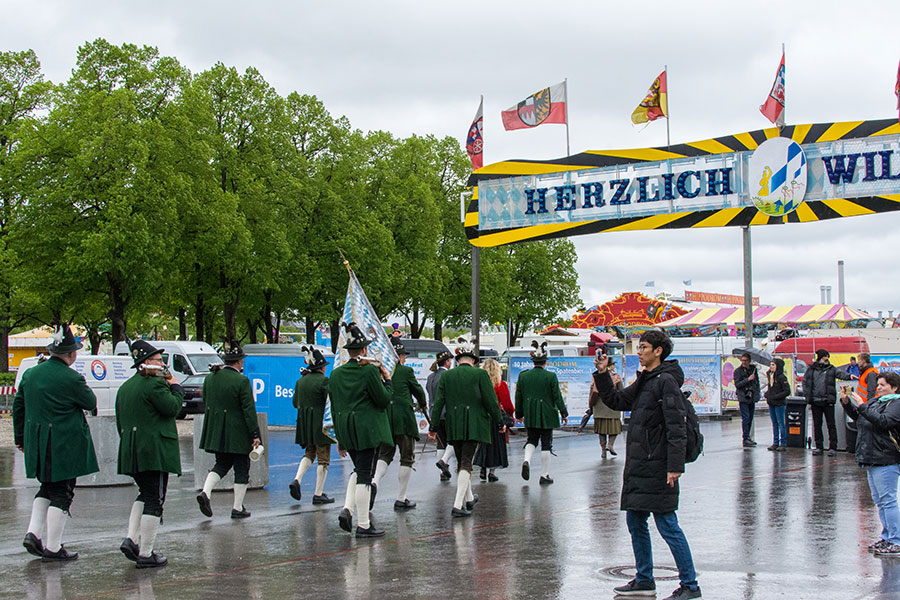 Locals parade onto the Wiesn at Munich Frühlingsfest.