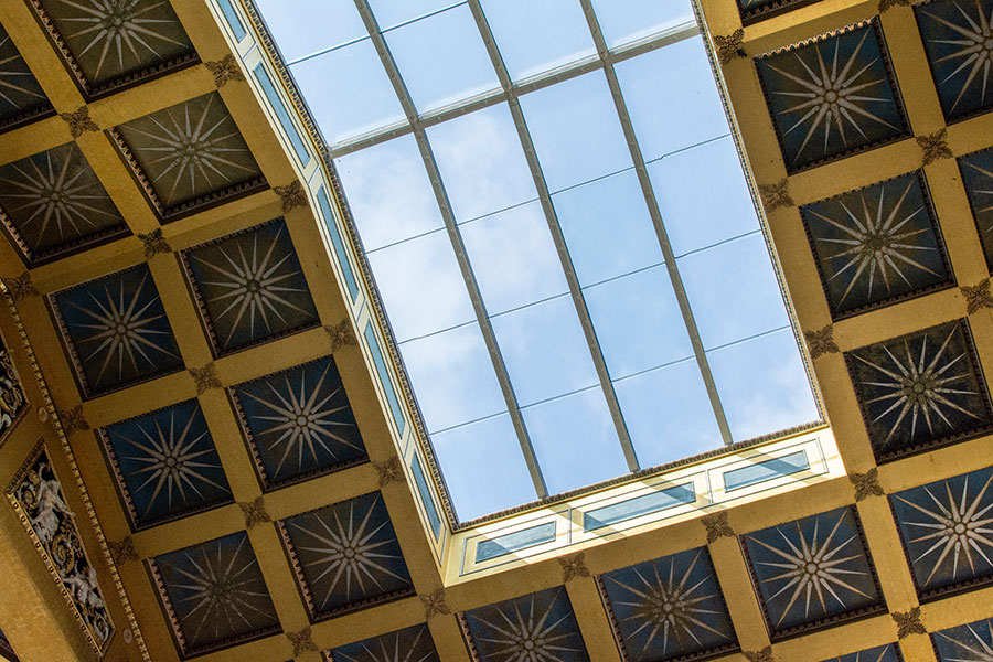 A close up of the highly decorated tile ceiling.