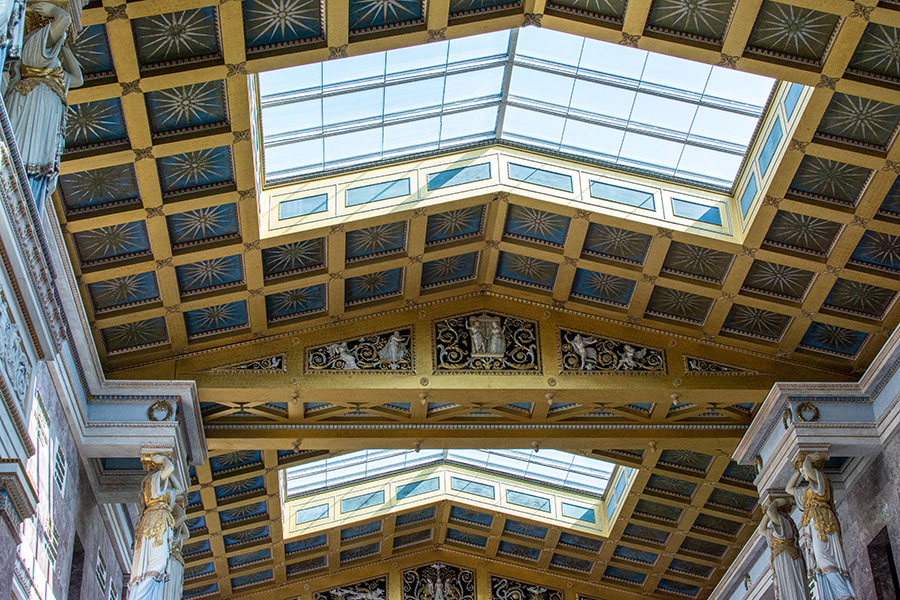 High ceilings with glass panels let in lots of natural light and are ornately decorated inside of Walhalla.