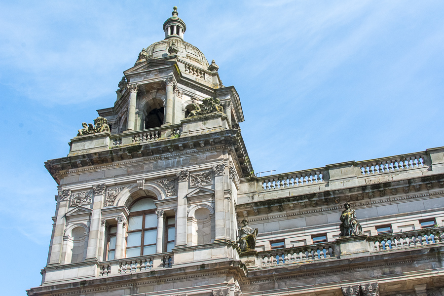 Looking up at the corner of the Glasgow City Chambers building.