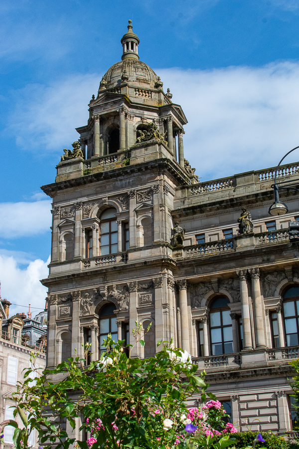 Flowers brighten the corner of the Glasgow City Chambers building.