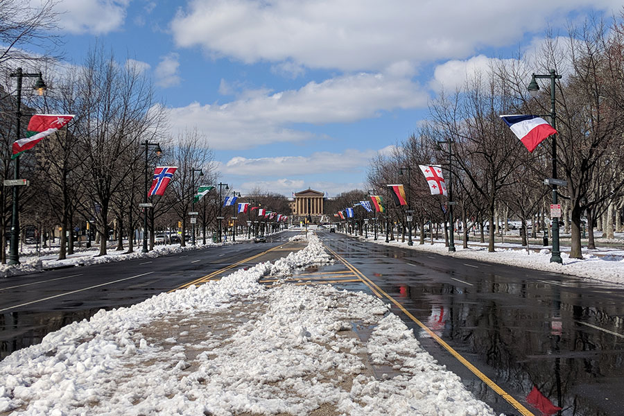 Snow lines the Benjamin Franklin Parkway ahead of the Art Museum in Philadelphia.