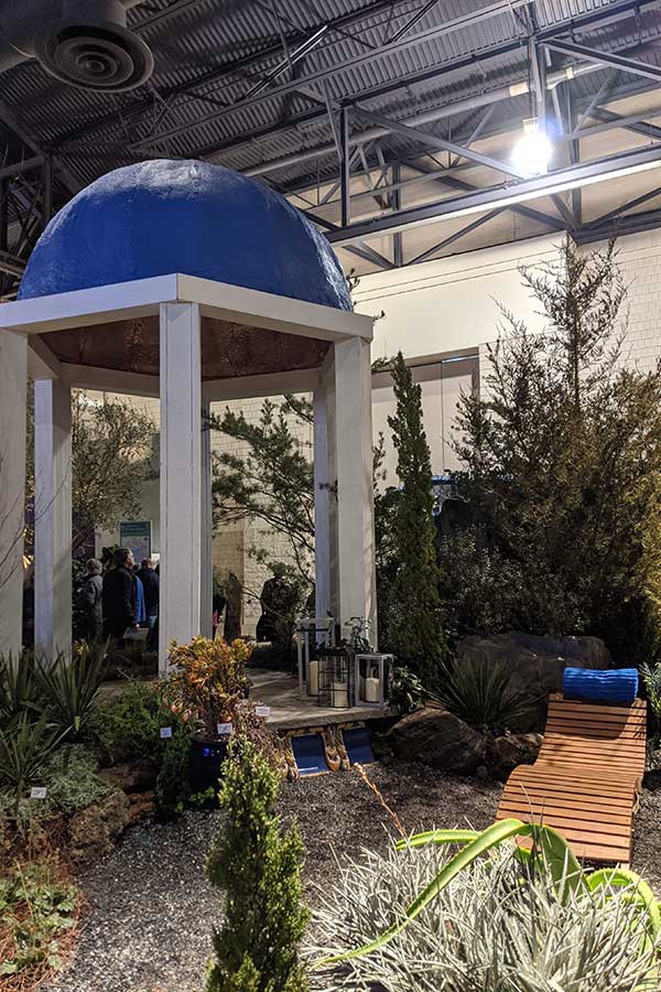 A Mediterranean inspired backyard landscaping exhibit at the Flower Show.