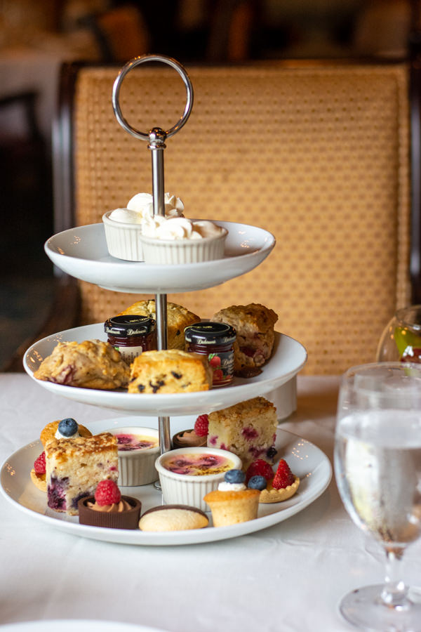 Three tiers of scones, pastries, and sweets at the Hotel DuPont afternoon tea.