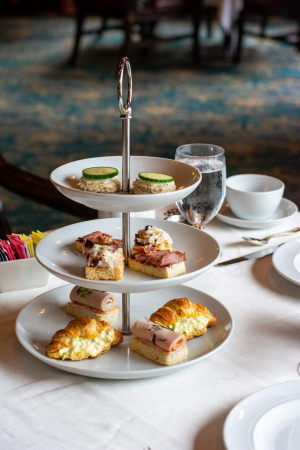 Three tiers of tea sandwiches at the Hotel DuPont afternoon tea.