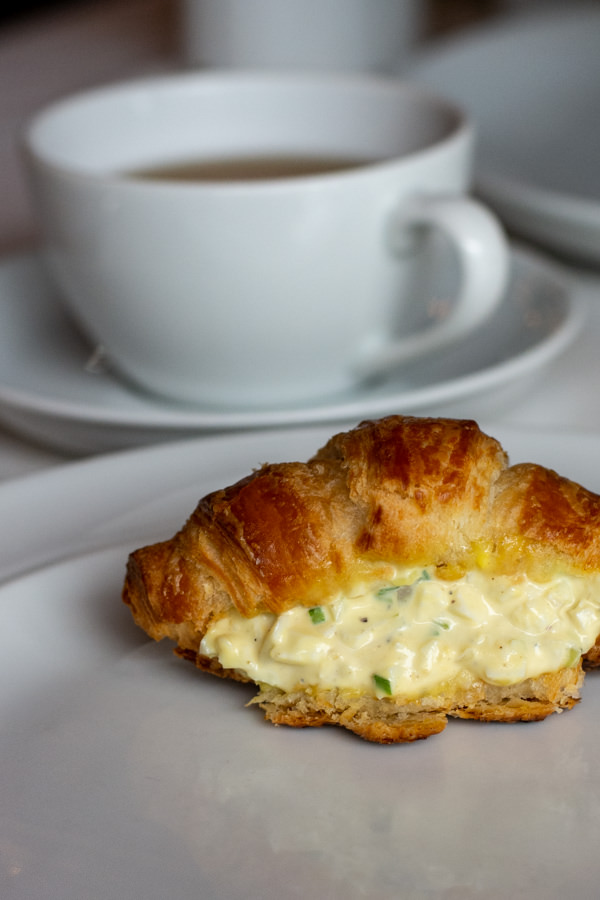 On the menu at the Hotel DuPont afternoon tea is a truffle egg salad croissant sandwich.