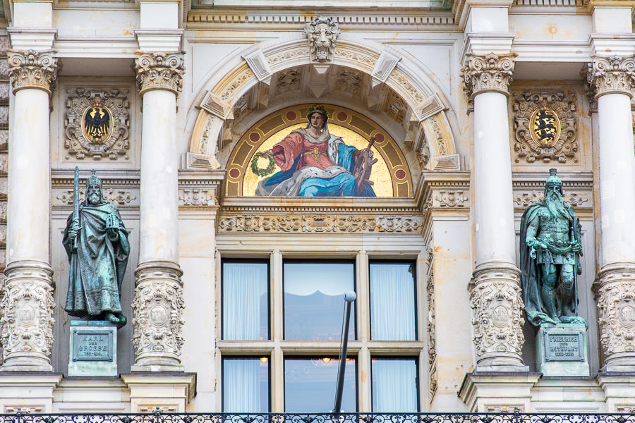 A close up of the detailed exterior of the Hamburg city hall.