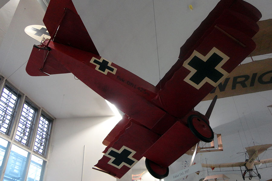 The Red Baron's airplane hangs from the ceiling of the Deutsches Museum.