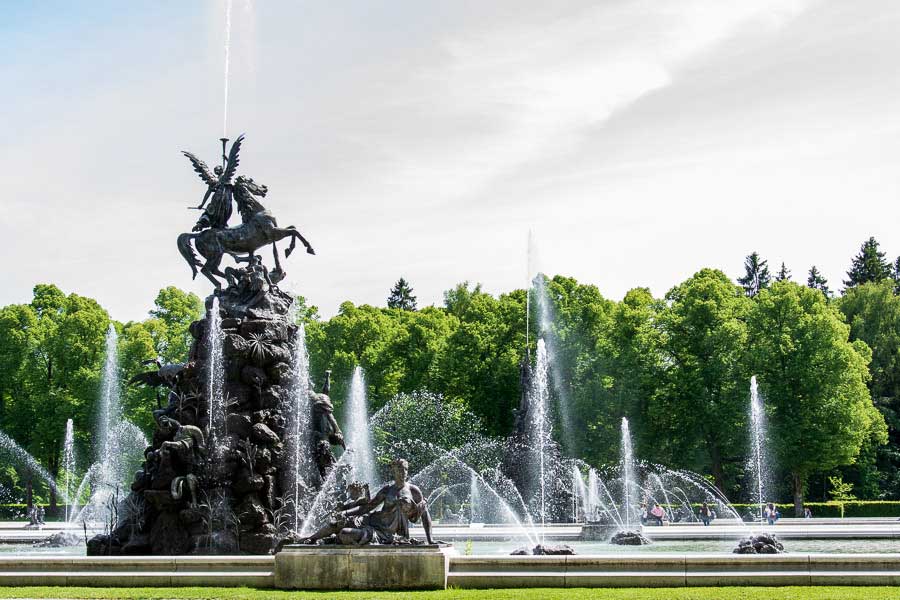 Looking across the water fountains of the Herrenchiemsee grounds.