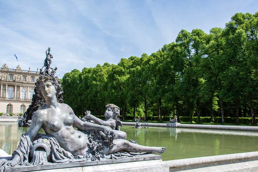 Close up of the sculptures along the fountain edge at Herrenchiemsee palace.